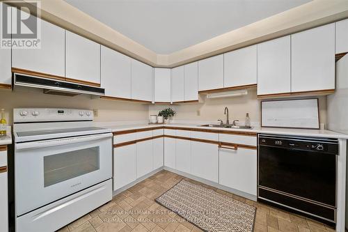 404 - 1 Queen Street, Cobourg, ON - Indoor Photo Showing Kitchen With Double Sink