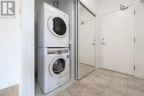 1007 - 12 York Street, Toronto, ON - Indoor Photo Showing Laundry Room