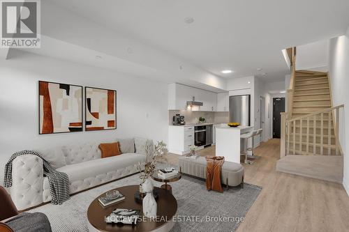 303 - 485 Logan Avenue, Toronto, ON - Indoor Photo Showing Living Room