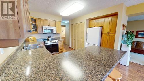 10626 102 Street, Fort St. John, BC - Indoor Photo Showing Kitchen With Double Sink