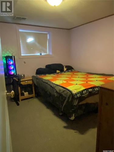 236 10Th Street Ne, Weyburn, SK - Indoor Photo Showing Bedroom