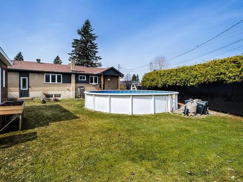 Backyard - 313 Rue Dupré, Beloeil, QC - Outdoor With Above Ground Pool With Backyard