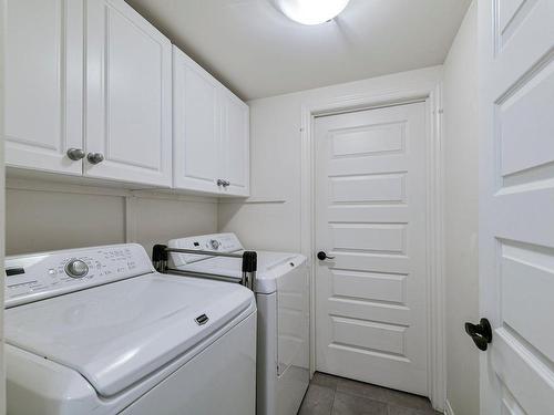 Salle de lavage - 135 Rue Ste-Geneviève, Les Cèdres, QC - Indoor Photo Showing Laundry Room