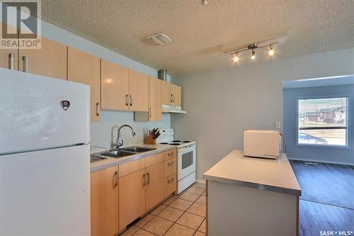 837 7Th Street E, Prince Albert, SK - Indoor Photo Showing Kitchen With Double Sink