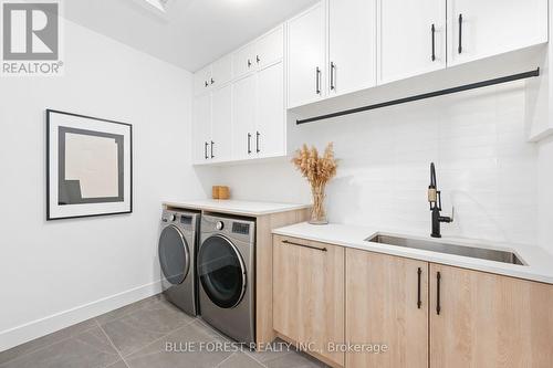 102 Edgewater Blvd W, Middlesex Centre, ON - Indoor Photo Showing Laundry Room