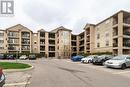 #406 -1483 Maple Ave, Milton, ON  - Outdoor With Balcony With Facade 