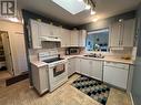 8905 Pineo Court Unit# 306, Summerland, BC  - Indoor Photo Showing Kitchen With Double Sink 