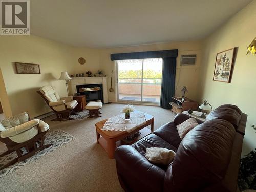 8905 Pineo Court Unit# 306, Summerland, BC - Indoor Photo Showing Living Room With Fireplace