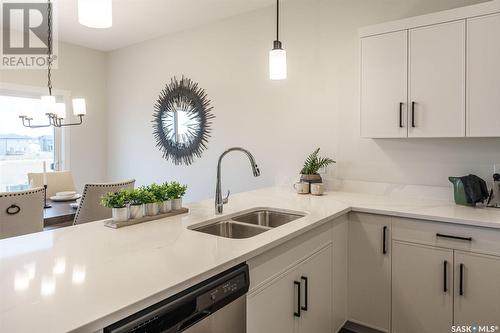 319 Dziadyk Bend, Saskatoon, SK - Indoor Photo Showing Kitchen With Double Sink