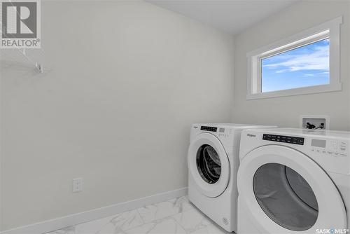 328 Leskiw Bend, Saskatoon, SK - Indoor Photo Showing Laundry Room
