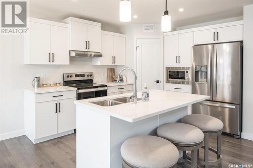 543 Keith Turn, Saskatoon, SK - Indoor Photo Showing Kitchen With Double Sink With Upgraded Kitchen