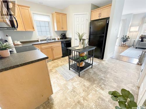 120 503 Colonel Otter Drive, Swift Current, SK - Indoor Photo Showing Kitchen With Double Sink