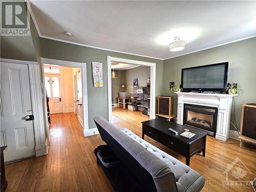 64 Abbott Street, Brockville, ON - Indoor Photo Showing Living Room With Fireplace