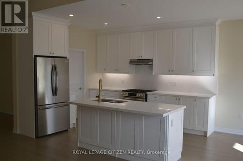 10 Lawson Avenue, Kawartha Lakes, ON - Indoor Photo Showing Kitchen With Stainless Steel Kitchen With Double Sink