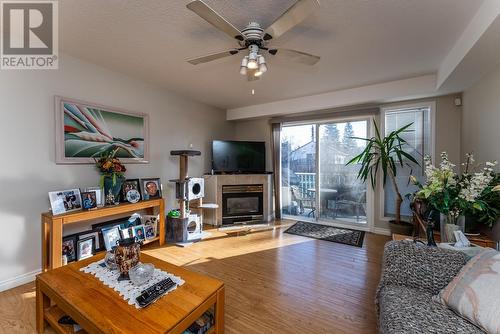 107 2423 8Th Avenue, Prince George, BC - Indoor Photo Showing Living Room With Fireplace