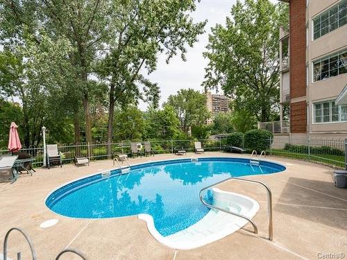 Pool - 203-77 Prom. Des Îles, Laval (Chomedey), QC - Outdoor With In Ground Pool With Backyard