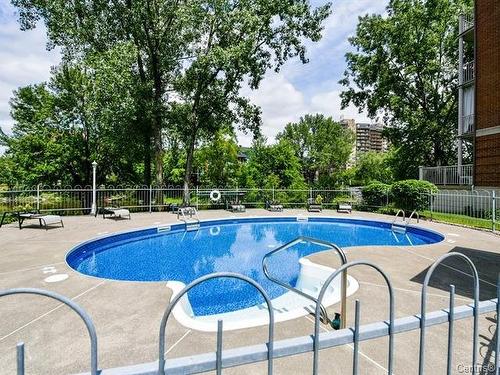 Piscine - 203-77 Prom. Des Îles, Laval (Chomedey), QC - Outdoor With In Ground Pool With Backyard