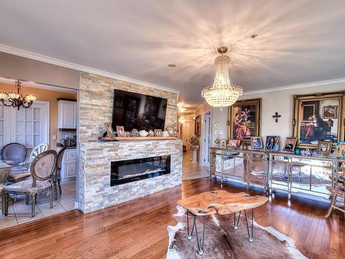 Salon - 203-77 Prom. Des Îles, Laval (Chomedey), QC - Indoor Photo Showing Living Room With Fireplace