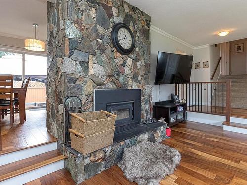 323 Benhomer Dr, Colwood, BC - Indoor With Fireplace