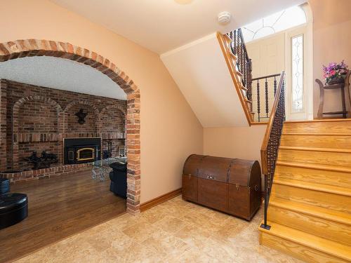 Sous-sol - 15 Rue Biscaye, Dollard-Des-Ormeaux, QC - Indoor With Fireplace
