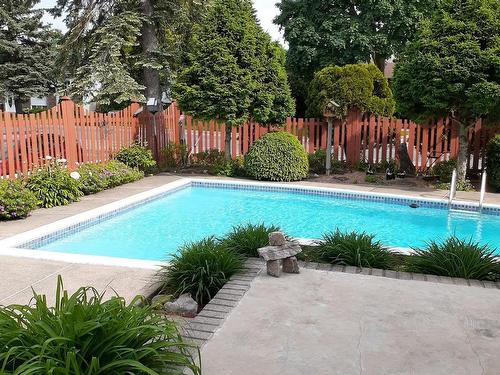 Piscine - 15 Rue Biscaye, Dollard-Des-Ormeaux, QC - Outdoor With In Ground Pool With Deck Patio Veranda With Backyard