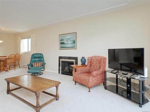 303-545 Rithet St, Victoria, BC - Indoor Photo Showing Living Room With Fireplace
