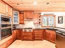 285 & 289 Canvasback Pl, Salt Spring, BC  - Indoor Photo Showing Kitchen With Double Sink 