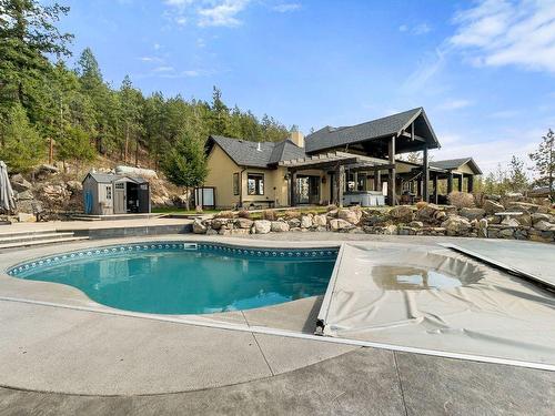 5500 Rockface Road, Kelowna, BC - Outdoor With In Ground Pool