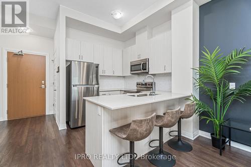 #627 -1105 Leger Way, Milton, ON - Indoor Photo Showing Kitchen With Stainless Steel Kitchen