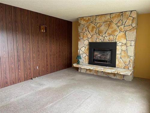 4826 Bruce St, Port Alberni, BC - Indoor Photo Showing Living Room With Fireplace