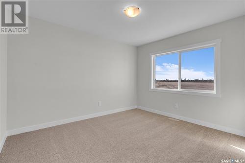 327 Dziadyk Bend, Saskatoon, SK - Indoor Photo Showing Other Room