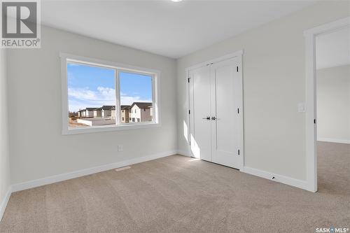 327 Dziadyk Bend, Saskatoon, SK - Indoor Photo Showing Other Room