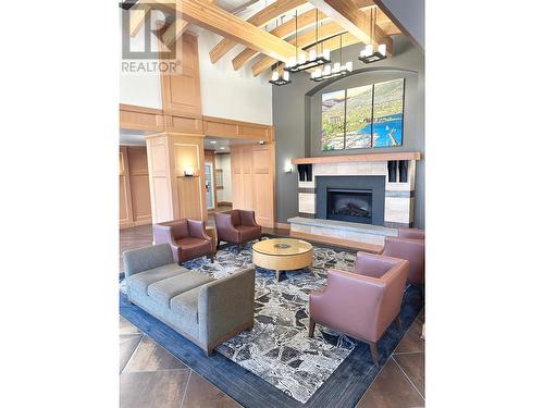 160 Lakeshore Drive Unit# 703, Penticton, BC - Indoor Photo Showing Living Room With Fireplace