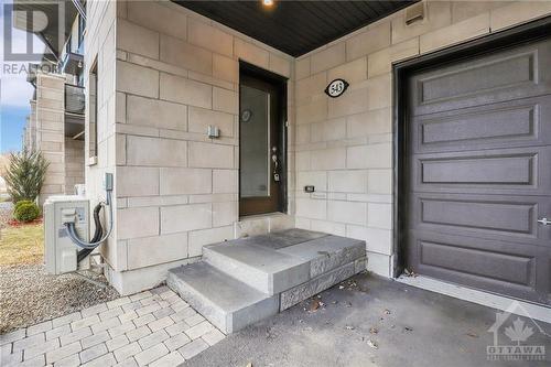 Bright entrance with covered parking - 543 Labrador Crescent, Ottawa, ON - Outdoor With Exterior