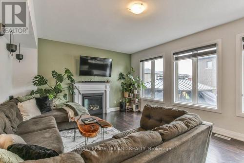 1104 Edinburgh Dr, Woodstock, ON - Indoor Photo Showing Living Room With Fireplace
