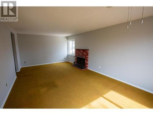 11 Amber Drive, Logan Lake, BC - Indoor With Fireplace
