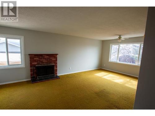 11 Amber Drive, Logan Lake, BC - Indoor Photo Showing Living Room With Fireplace