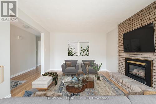 350 Woodbine Ave, Peterborough, ON - Indoor Photo Showing Living Room With Fireplace