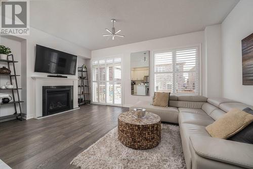 27 Robb Thompson Rd, East Gwillimbury, ON - Indoor Photo Showing Living Room With Fireplace