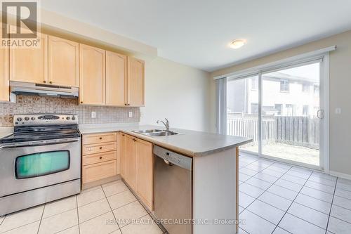 5367 Longford Drive, Mississauga, ON - Indoor Photo Showing Kitchen With Double Sink
