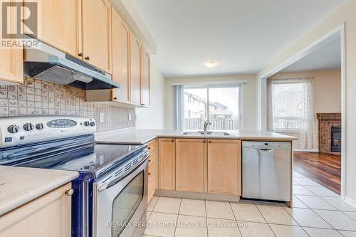 5367 Longford Drive, Mississauga, ON - Indoor Photo Showing Kitchen With Double Sink