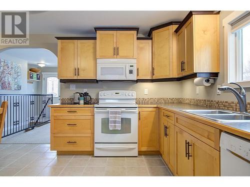 1800A 35 Avenue, Vernon, BC - Indoor Photo Showing Kitchen With Double Sink