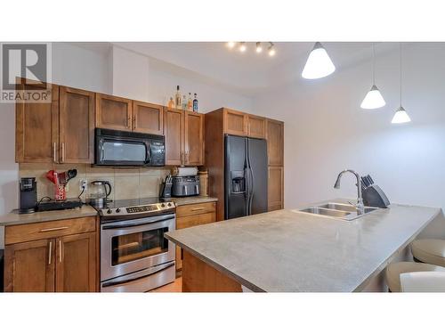 1331 Ellis Street Unit# 204, Kelowna, BC - Indoor Photo Showing Kitchen With Double Sink