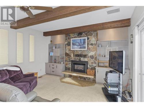 3574 East Vernon Road, Vernon, BC - Indoor Photo Showing Living Room With Fireplace