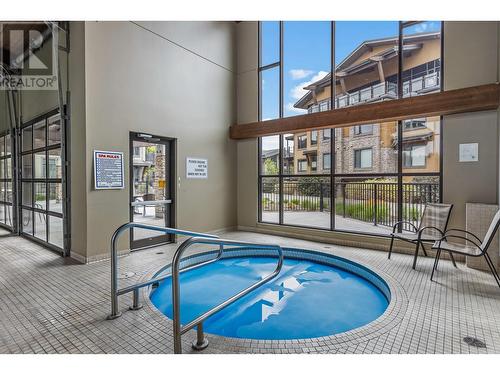 4380 Lakeshore Road Unit# 219, Kelowna, BC - Indoor Photo Showing Other Room With In Ground Pool