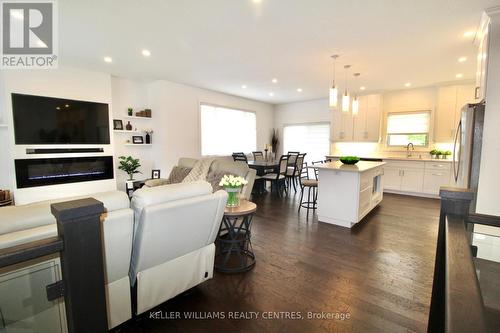 225 Devinwood Ave, Brockton, ON - Indoor Photo Showing Other Room With Fireplace