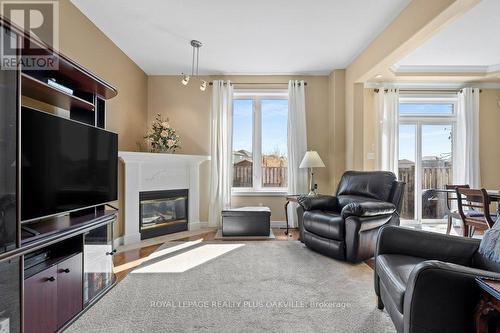 2468 Sutton Dr, Burlington, ON - Indoor Photo Showing Living Room With Fireplace