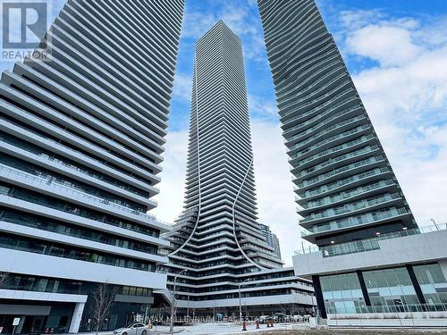 1513 - 30 Shore Breeze Drive, Toronto, ON - Outdoor With Balcony With Facade