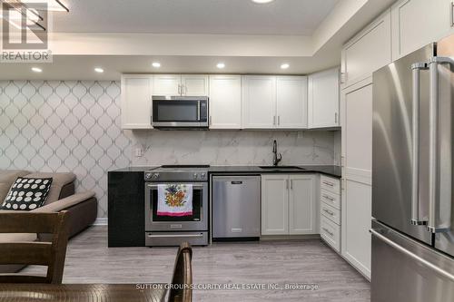 #307 -2464 Weston Rd, Toronto, ON - Indoor Photo Showing Kitchen With Upgraded Kitchen