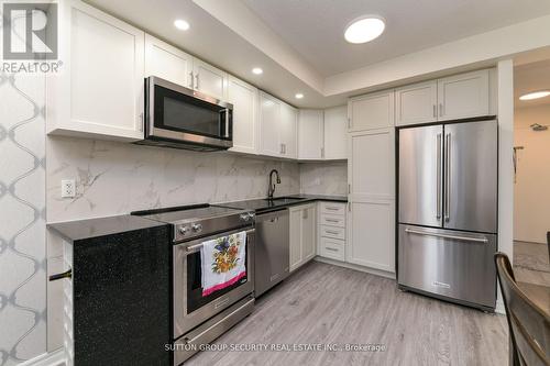 #307 -2464 Weston Rd, Toronto, ON - Indoor Photo Showing Kitchen With Upgraded Kitchen